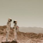 Space Suits - Astronauts Holding Hands on Mars