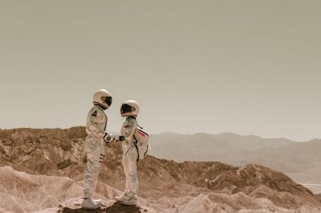 Space Suits - Astronauts Holding Hands on Mars