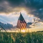 American Military - flag of USA on grass field